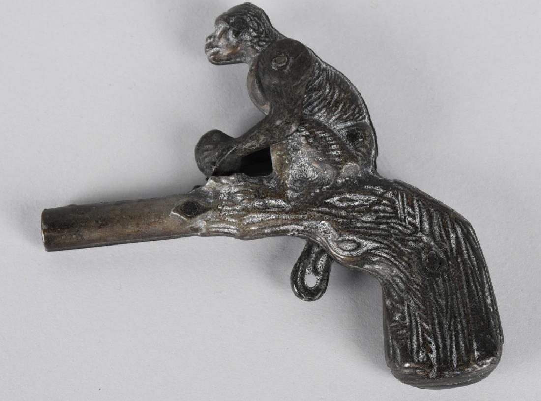 MONKEY & COCONUT CAST METAL CAP PISTOL: Very nice animated cap pistol cast in a non ferrous metal. The cast detail is great and the action works just like the original. Not sure when this was made but more contemporary than the original Ste