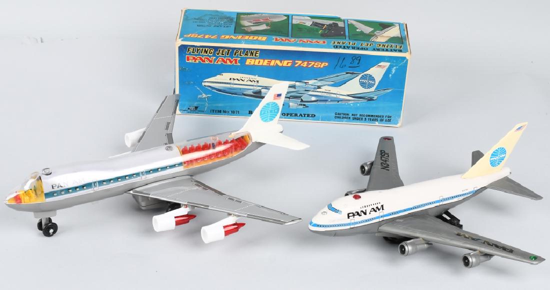2-TIN Battery Op PAN AM AIRPLANES, one BOXED: The Pan Am Boeing 747SP is Made in Japan and includes the original box. It appears unplayed with, and is untested. The other tin Plane is Made in Taiwan, and worked well when tested. It is the largest