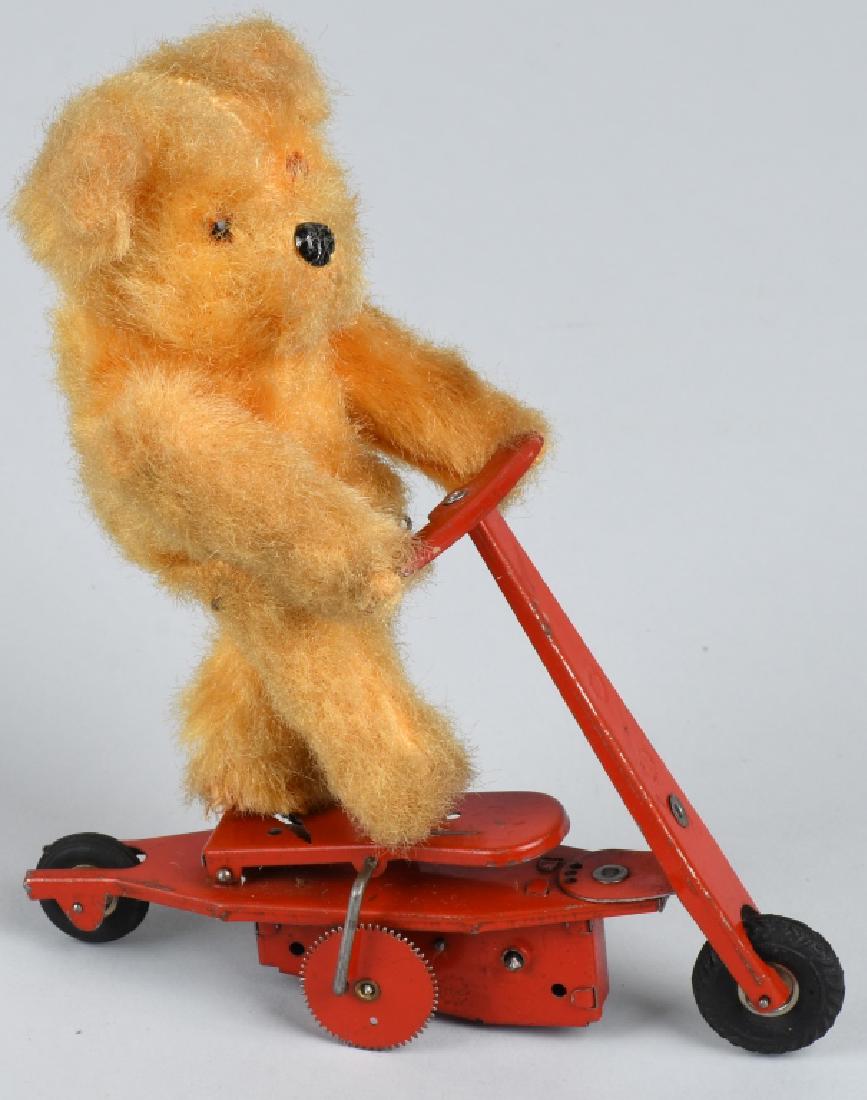 GERMAN TIN windup MOHAIR BEAR on SCOOTER (1 of 4)