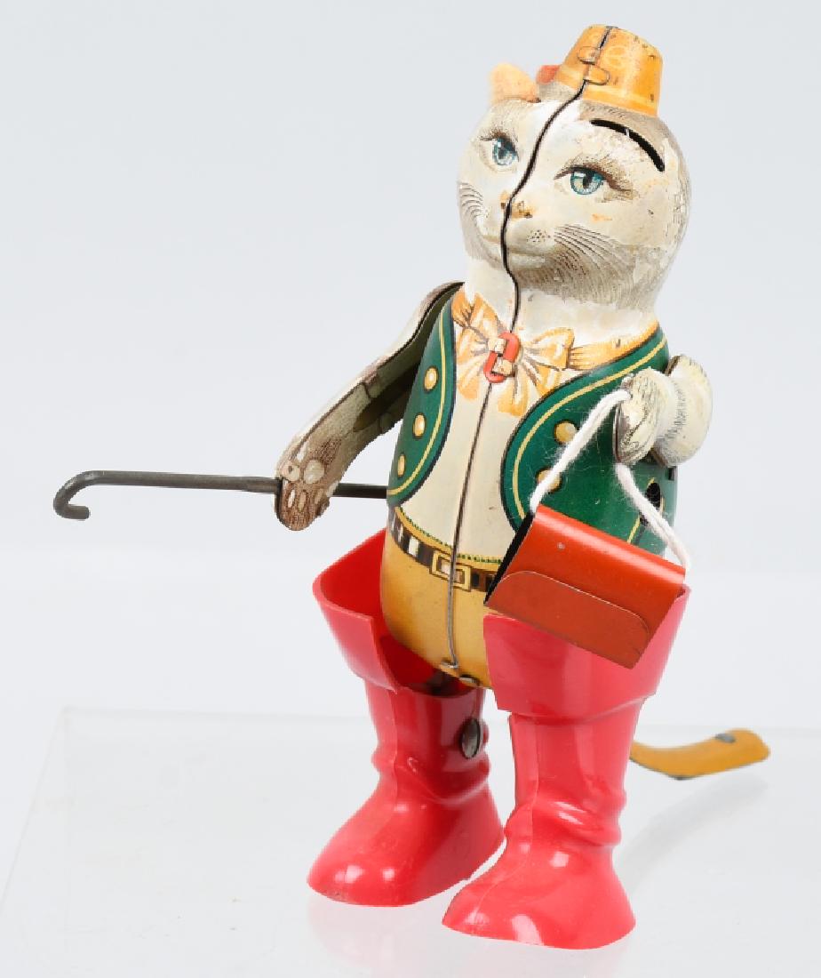 GERMAN PUSS -N-BOOTS TIN windup TOY: Mostly tin toy with plastic boots. Windup worked when tested. 4 3/4", Very Good