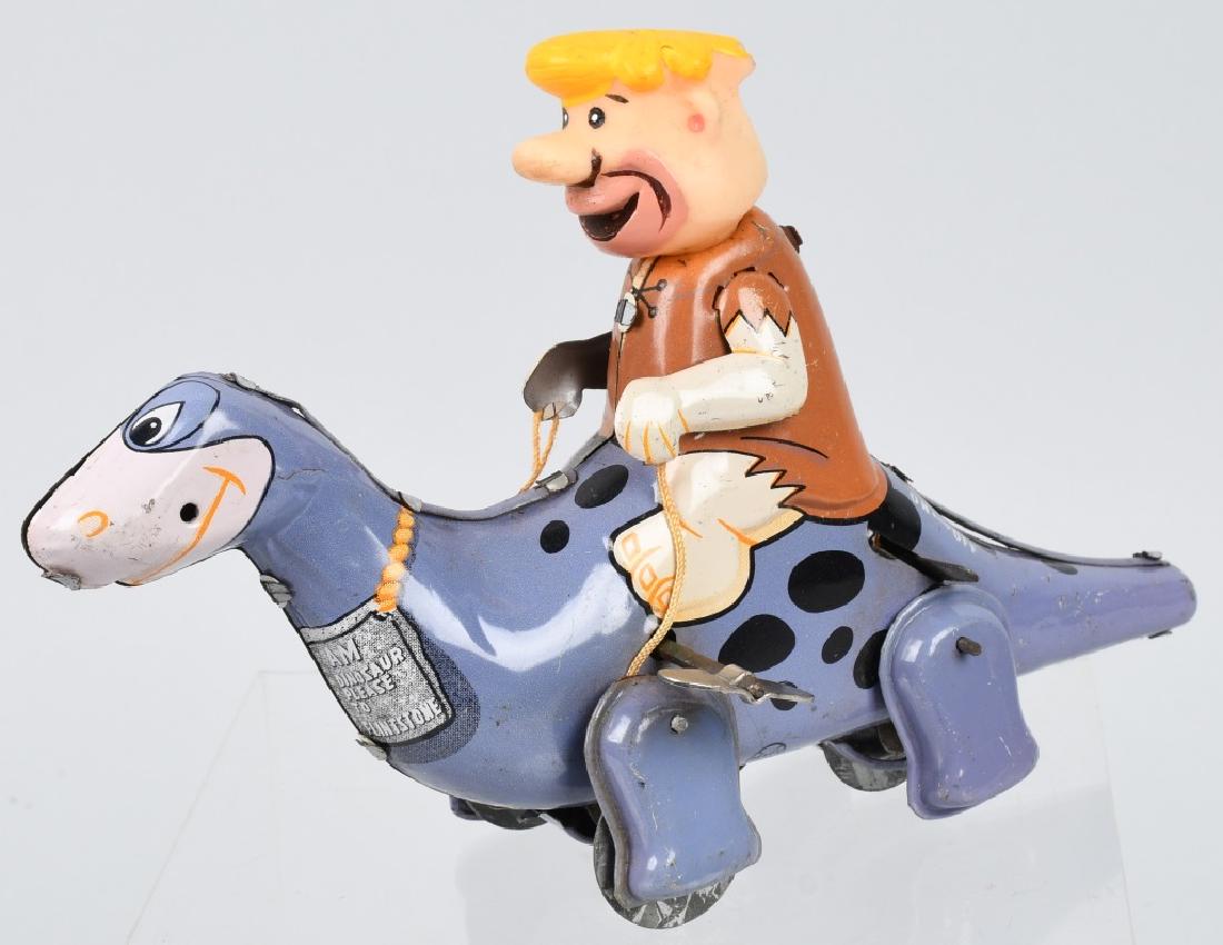 MARX JAPAN TIN windup BARNEY RUBBLE on DINO: Very nice toy that worked when tested. Minor wear. Nice colors and condition. 8", Excellent