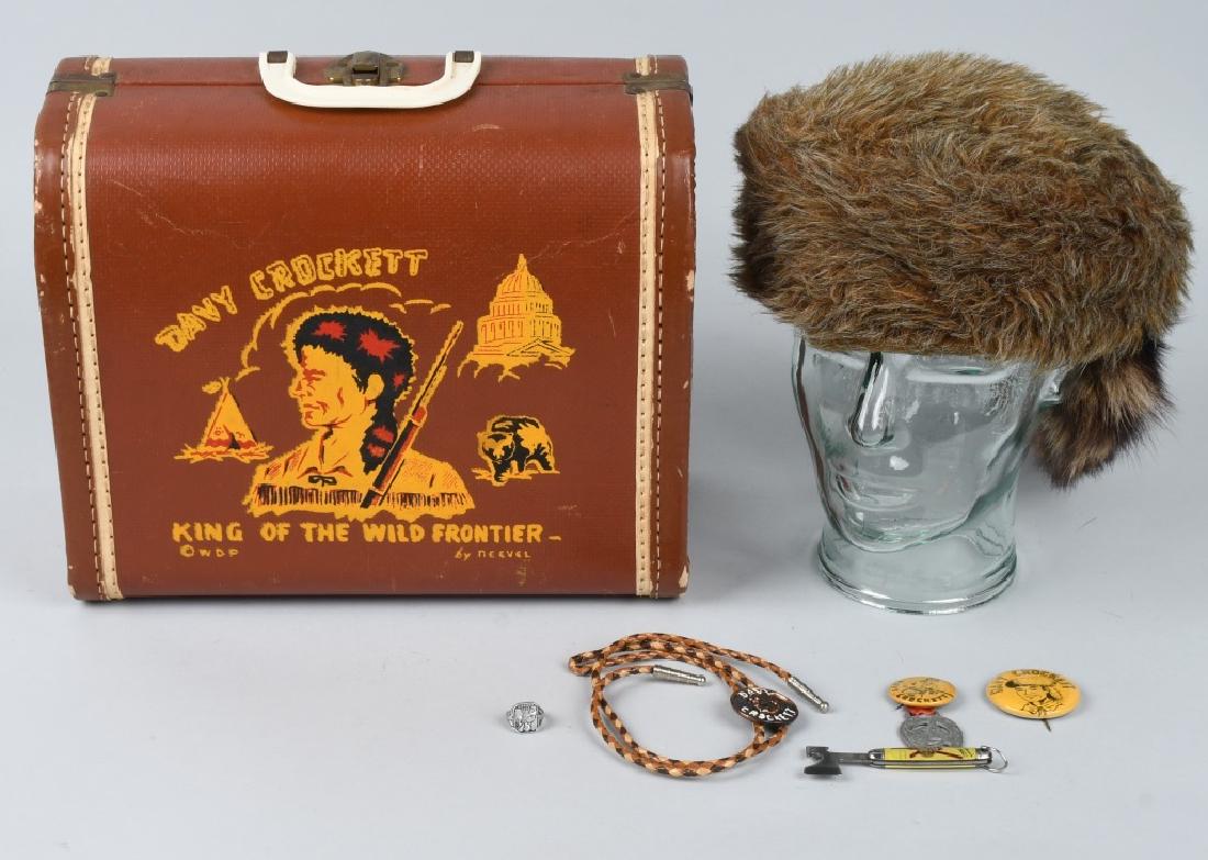 DAVY CROCKETT VINTAGE TOY LOT: Nice lot includes Walt Disney Davy Crockett suit case, 12" by 10", an Imperial knife with Fess Parker as Davy Crockett, 2 - pinback buttons, largest is 1 3/4" diameter, a aluminum Davy Crockett premiu