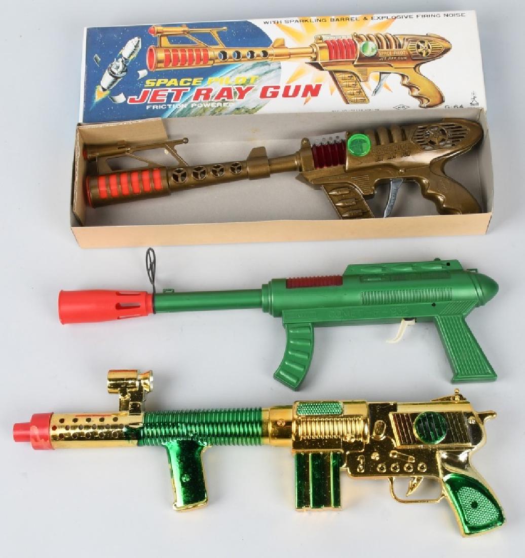 JAPAN SPACE JET RAY GUN BOXED, and MORE: The plastic Japan Jet Ray Gun is 16", and is old store stock in the original colorful box. Also included is a plastic ,16" Comet F-932, made in Greece, and a plastic unmarked gold and green Space Gun.