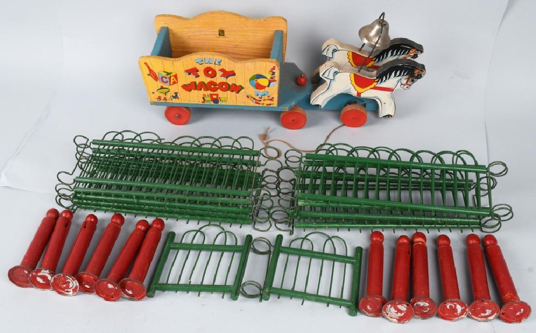 FISHER PRICE NO. 171, and CHRISTMAS TOY FENCE: The Toy Wagon was first introduced by Fisher Price in 1942. This example measures 18" and only has minor edge wear. The Christmas fence was made by W. Drake Co in the 1930's-40's. It consists of 10 -