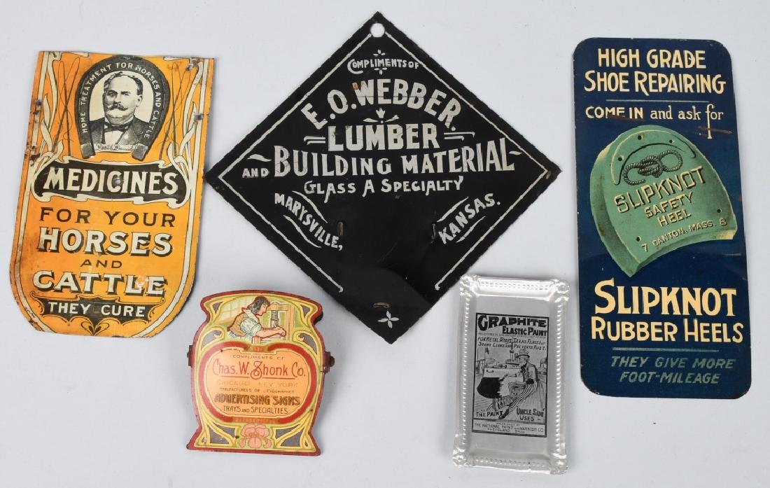 LOT OF TIN ADVERTISING ITEMS: Includes Chas Shonk Signs Clip, Graphite Paint Tray, EO Webber Lumber Sign, Slipknot Rubber Heels Sign, and Horse Medicines Sign missing top. Good-Excellent