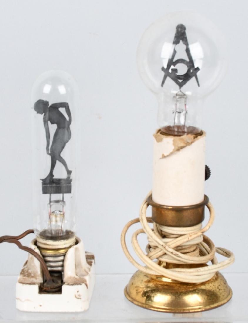 AEROLUX WOMAN & GRANGE SYMBOL LIGHT BULBS: Includes Woman and Grange Symbol Light Bulbs. Both with Bases.