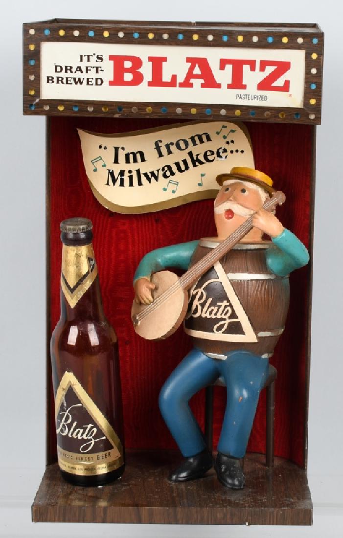 BLATZ BEER ELECTRIC ADVERTISING FIGURE: Unusual cast metal and plastic electric Blatz Beer Advertising Figure. All original and in great condition. Missing Bottle. 17" Very Good-Excellent