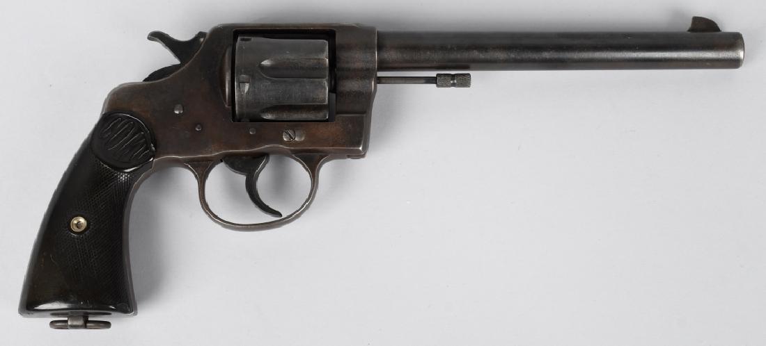 COLT NEW SERVICE .44-40 DA REVOLVER, MFG 1900: SN 16402, Colt New Service, Old Model revolver MFG 1906, 7 1/2" barrel with good bore. .44-40 caliber, Cold blue finish with light pitting. Visible markings with nice hard rubber grips. Both double an