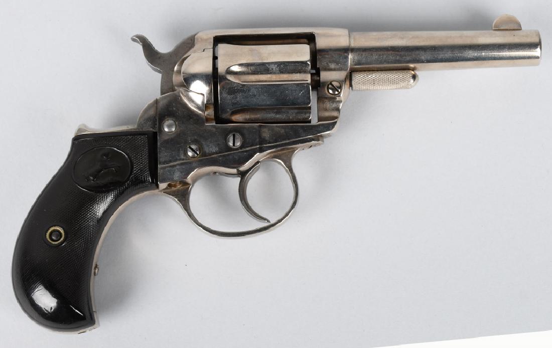 COLT MODEL 1877 LIGHTNING .38 REVOLVER, MFG 1888: SN 65691, MFG 1888. 3 1/2" barrel with good bore. Single and double action both work. Gun has been nicely re-nickeled and markings are clear. Nice hard rubber grips. Antique, Very Good-Excellent