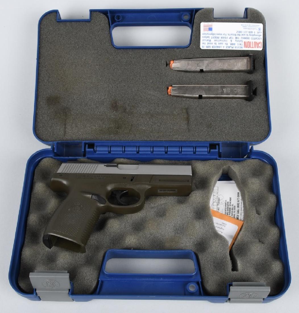 SMITH & WESSON SW40, .40 PISTOL, BOXED: SN PDM1972, 4" barrel with excellent bore. Slide has excellent stainless finish. Action works well. Includes original hard case and paperwork. Excellent*