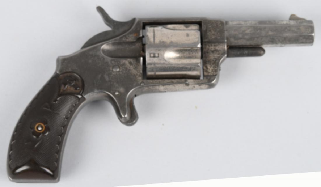 HOPKINS & ALLEN XL No. 5, .38 REVOLVER: Hopkins and Allen spur trigger .38 5 shot revolver. 2 1/2" barrel, 40% nickel plating, and good Merwin dog-head hard rubber grips. Action works well. Antique, Very Good