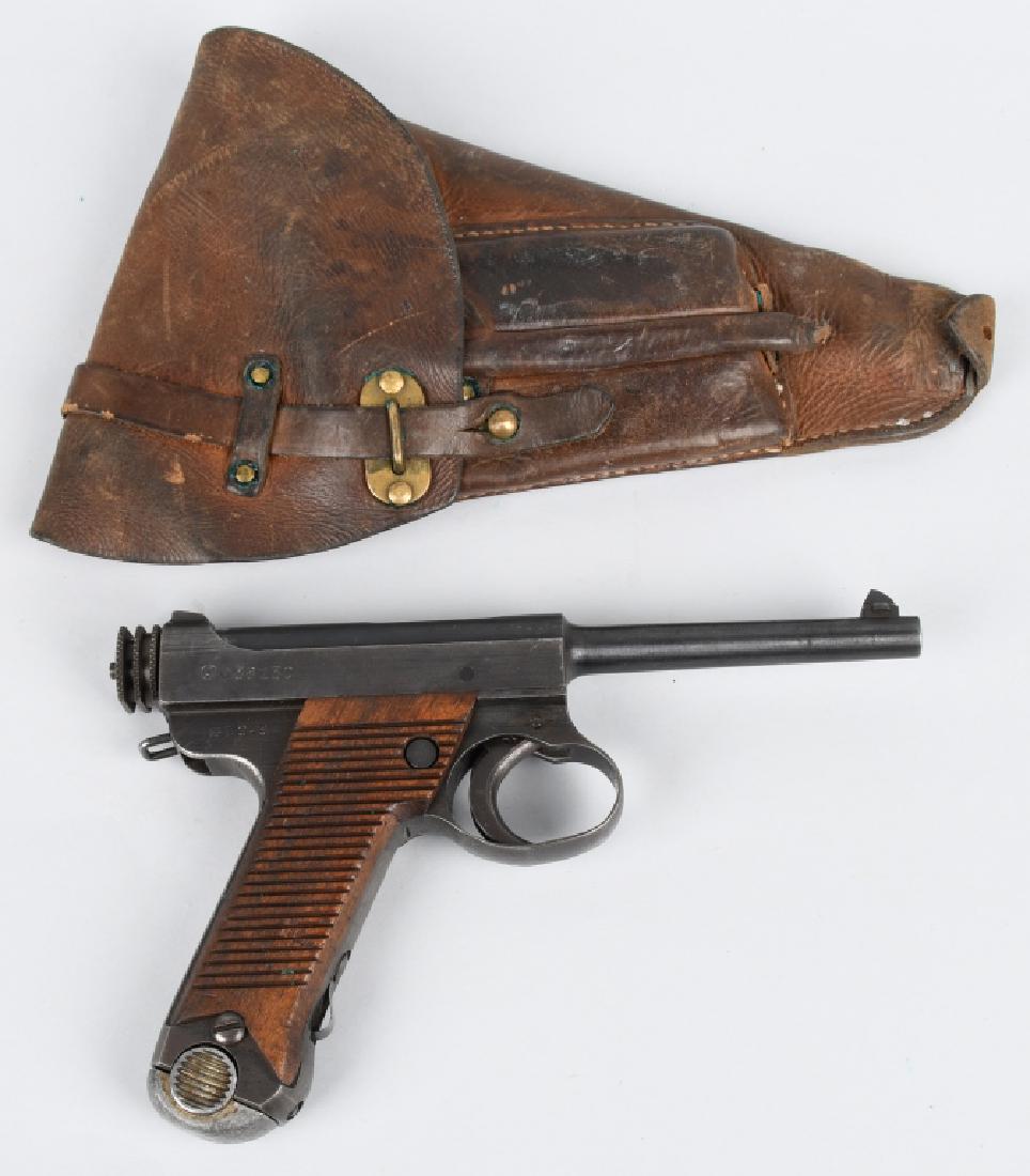 JAPANESE TYPE 14 NAMBU 8mm PISTOL w/ HOLSTER: SN 38130, Date code is 19.5. 4 3/4" barrel with excellent bore. Mostly smooth metal with traces of finish. Nice markings and original wood grips. Action works well and has replaced firing pin. Include