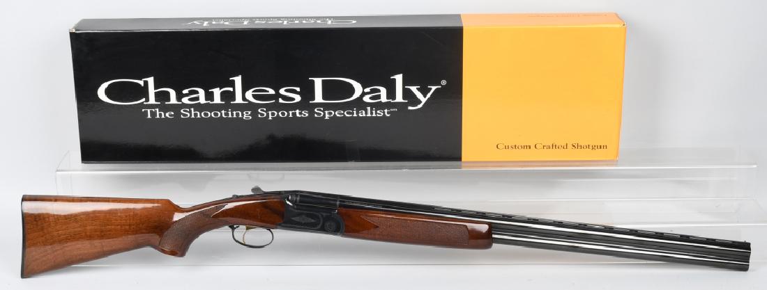 CHARLES DALY FIELD HUNTER 12 GA. O/U SHOTGUN: SN 57083, 28" over and under barrels with excellent bores. Top barrel is full choke, bottom barrel is improved modified choke. Beautiful finish and checkered deluxe grain wood stocks. Includes origina