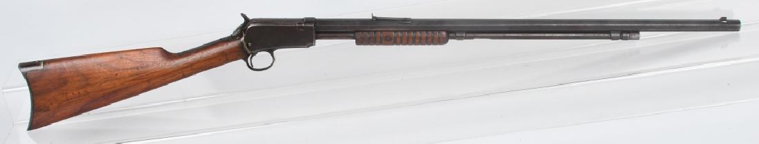 WINCHESTER MODEL 1890, .22 PUMP RIFLE, 1917: SN 581897, MFG 1917, 24" octagon barrel with fair to good bore. Chambered for .22 short. Finish turning plum brown. Stocks are good, Butt stock has been sanded, and forestock has old chip. Action work