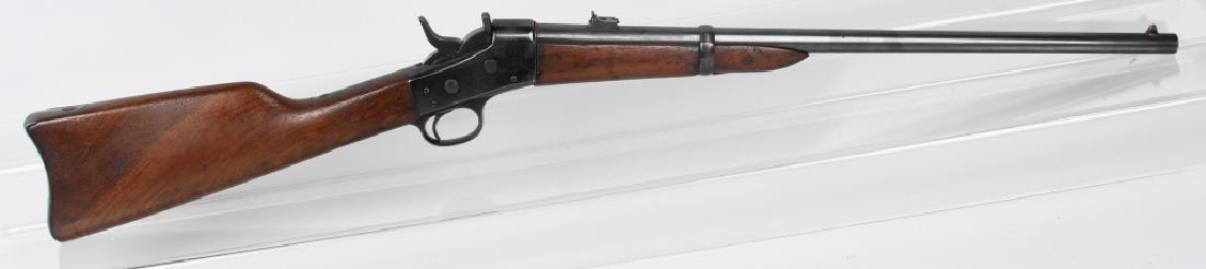 REMINGTON ROLLING BLOCK, .56-50cf CARBINE: Remington .56-50 center fire Saddle Ring Carbine. Gun has been re-barreled with 23 1/4" barrel with excellent bore. The metal is an attractive old re-blue, with very good refinished stocks. Good actio