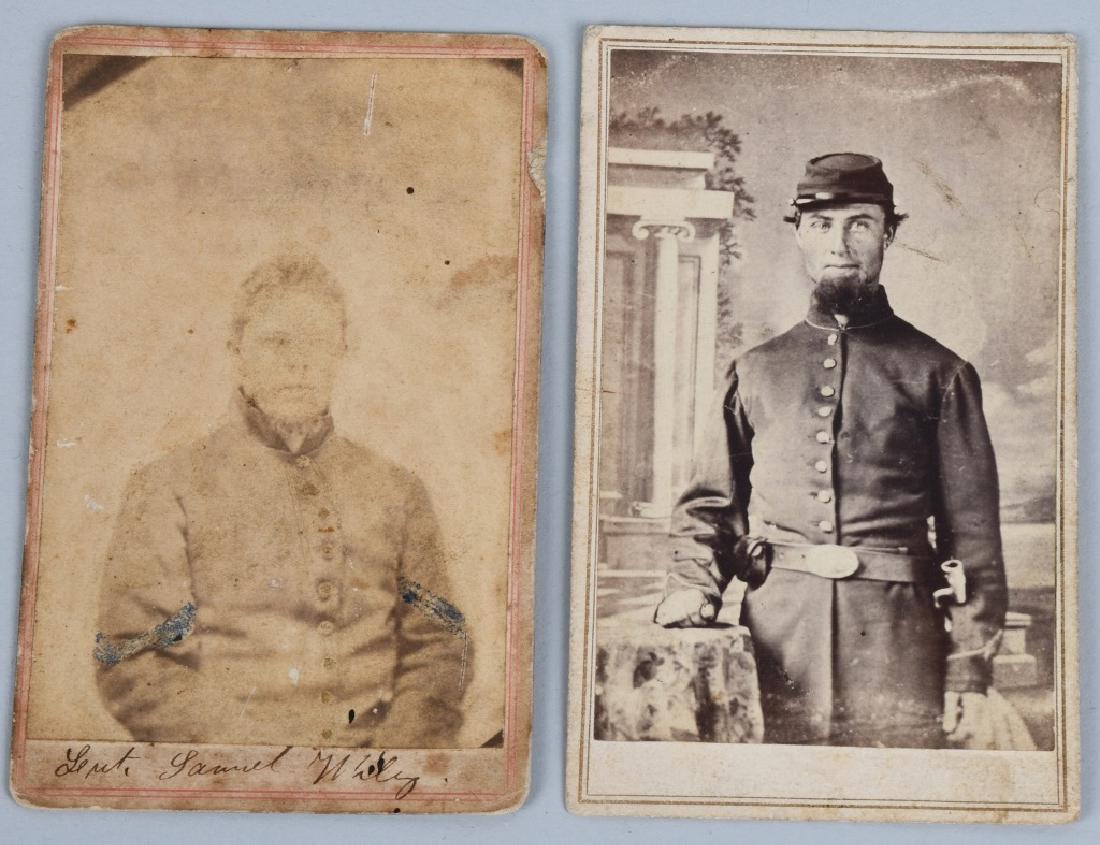 CIVIL WAR SOLDIER CDV LOT - 2 INCLUDING ONE IDED: CDV of a corporal with tinted blue chevrons. signed in Brown ink on the bottom "__ Samuel Wiley". image is light. The second image has a North Bridgewater, Massachusetts backmark and features an enlis