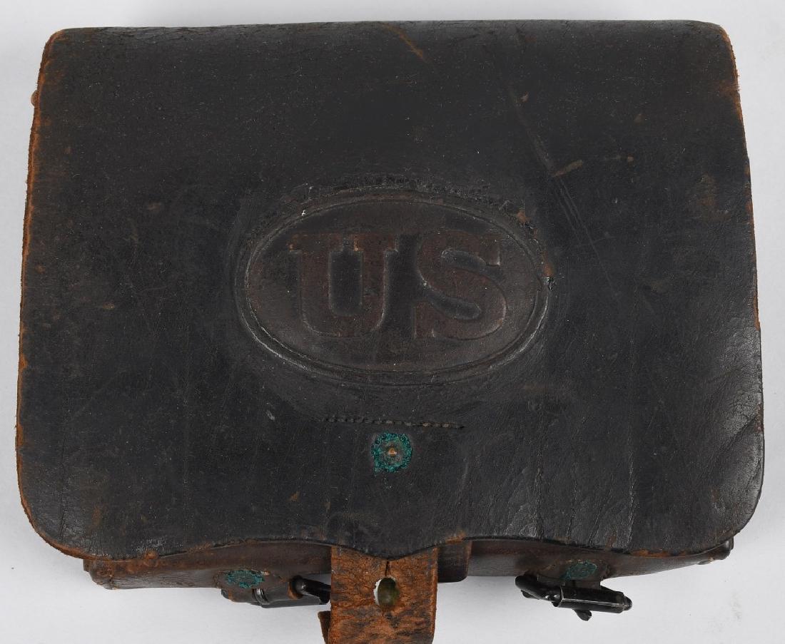 CIVIL WAR M 1864 CARTRIDGE BOX WITH TINS: M1864 cartridge box with embossed "US" box insignia. Box is maker stamped on the inside flap "H Metzger Phila ", and is inspector stamped, "H. H. Hartzell US Ord Dept Sub Inspector". Both tins are int