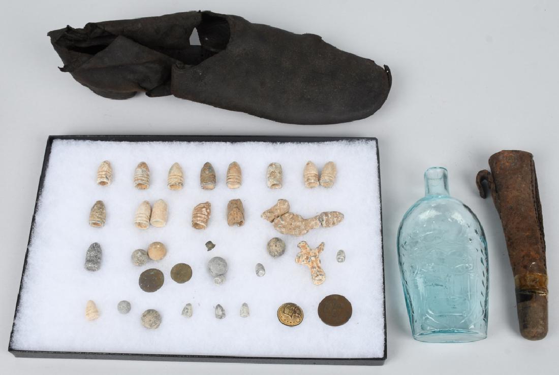 CIVIL WAR DUG RELICS GROUPING, FLASK, BROGAN ETC: Great grouping of dug Civil War relics. The grouping includes a rare find, a leather brogan. The brogan has come apart, but is in quite nice condition for being excavated. Has square nails in the heel