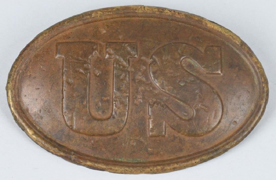 US MODEL 1839 OVAL CARTRIDGE BOX PLATE: Original Model 1839 oval cartridge box plate in very nice dug condition. Has nice patina, and retains both loops. Very Good-Excellent