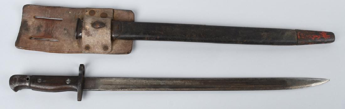 WW1 BRITISH ENFIELD BAYONET, FROG & SCABBARD.: Dated 1907 with British proof marks. 21 1/2" overall with 16 1/2" blade that has evidence of old sharpening. Includes correct scabbard and frog. Good-Very Good