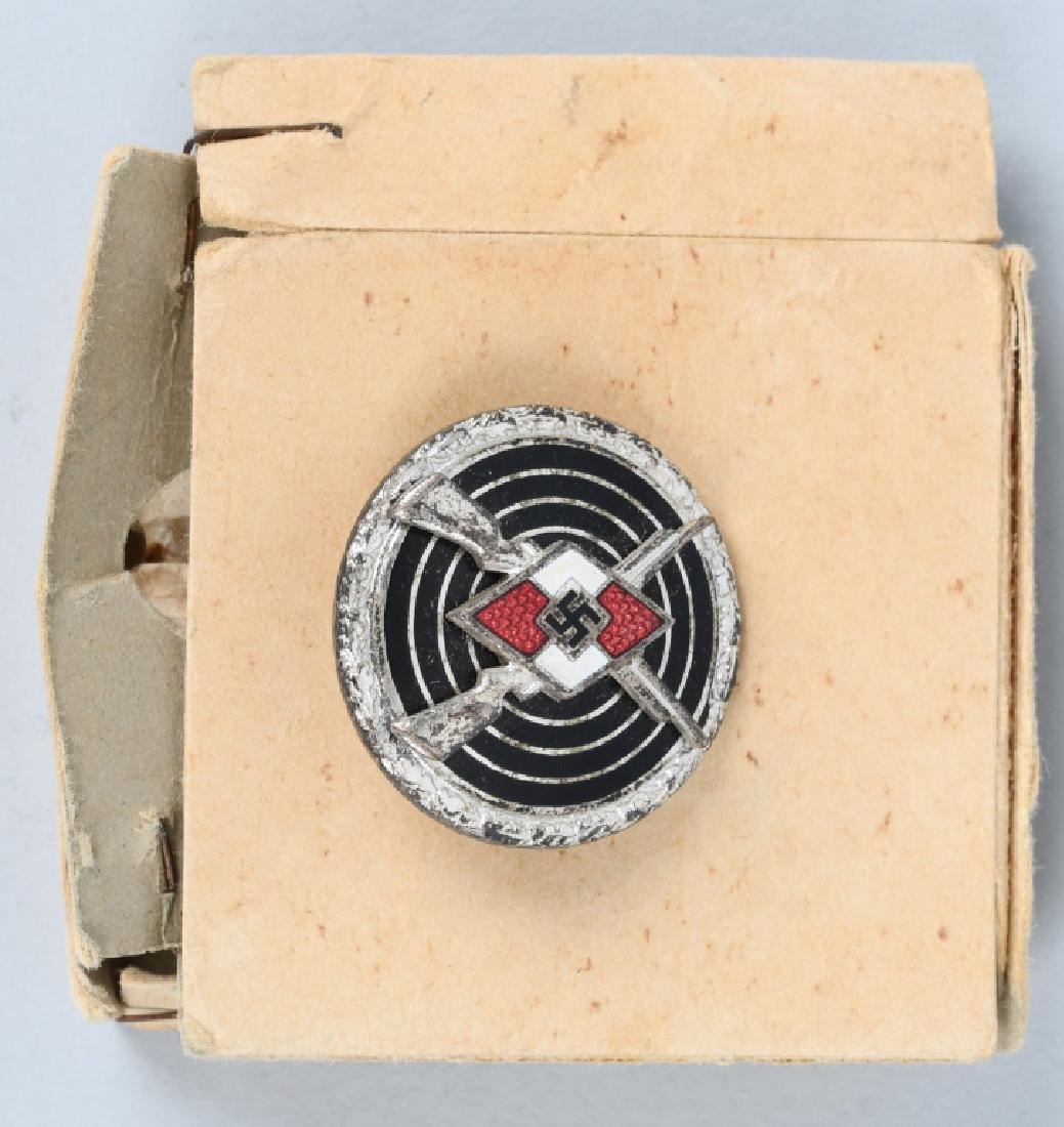 WWII NAZI GERMAN HITLER YOUTH SHARPSHOOTER BADGE: Hitler Youth HJ sharpshooter badge with the original box. Reverse of badge is RZM marked and also maker marked M1/102 ( Frank & Reif, Stuttgart ). Badge is in excellent condition.