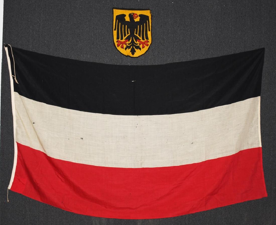 WWII GERMAN NSDAP FLAG - LARGE SIZE: Multi piece machine sewn wool and cotton construction NSDAP flag measuring 95.75" x 55.375" with some mothing. Also included is a 14" x 18" WWI Imperial German cloth eagle. very good.