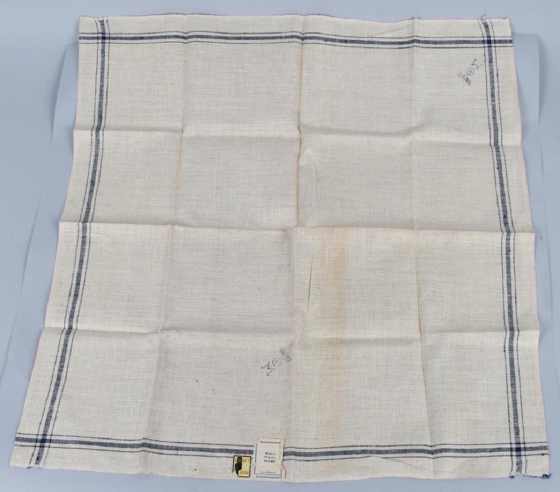 WWII NAZI GERMAN KREIGSMARINE OFFICER TABLE COVER: White linen Kreigsmarine officer's mess table cover with blue stripe that measures approx. 18.5" x 19". Corner of the cloth has a stamped eagle over "M". This cloth still retains the original manufact
