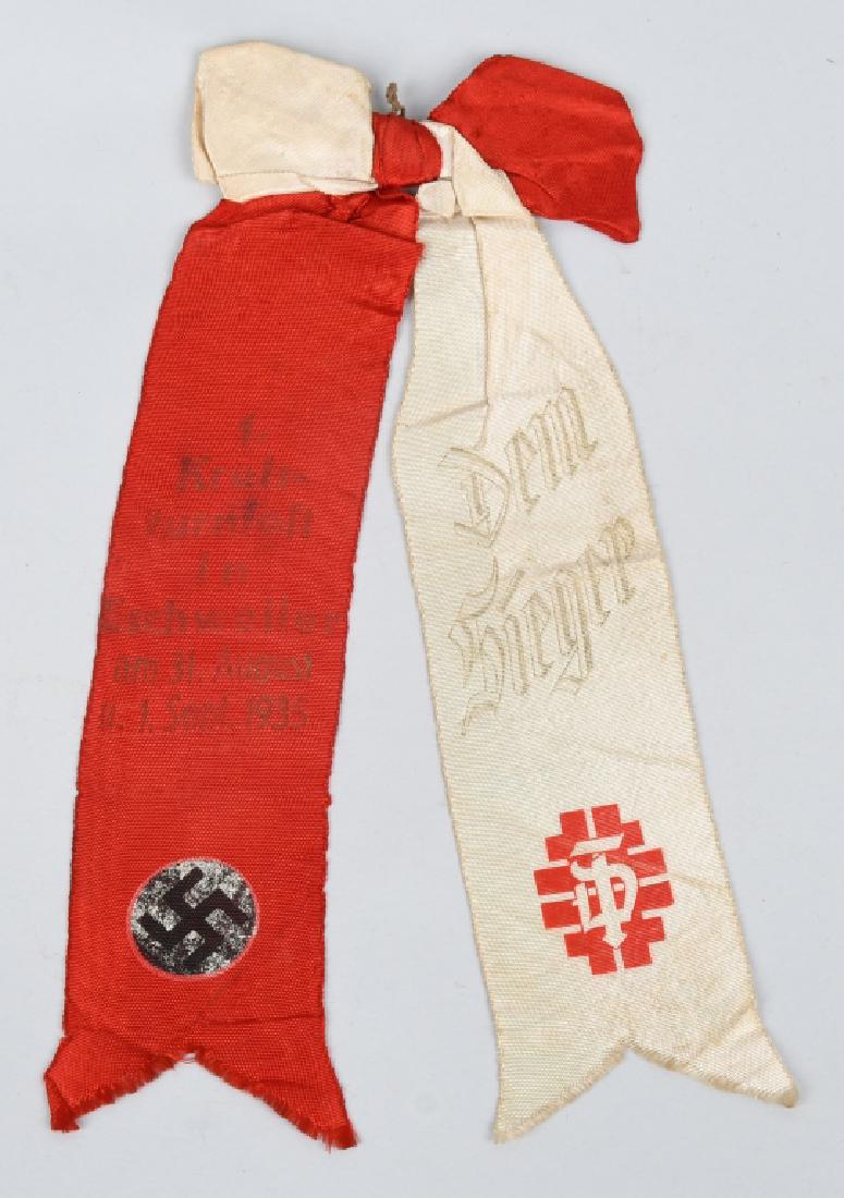 WWII NAZI GERMAN 1935 SPORTS AWARD RIBBON: Two piece red & white ribbon translates to "District Turnfelt in Eichweller 31 August - 1 September 1935. The winner".. Minor wear. very good - excellent.