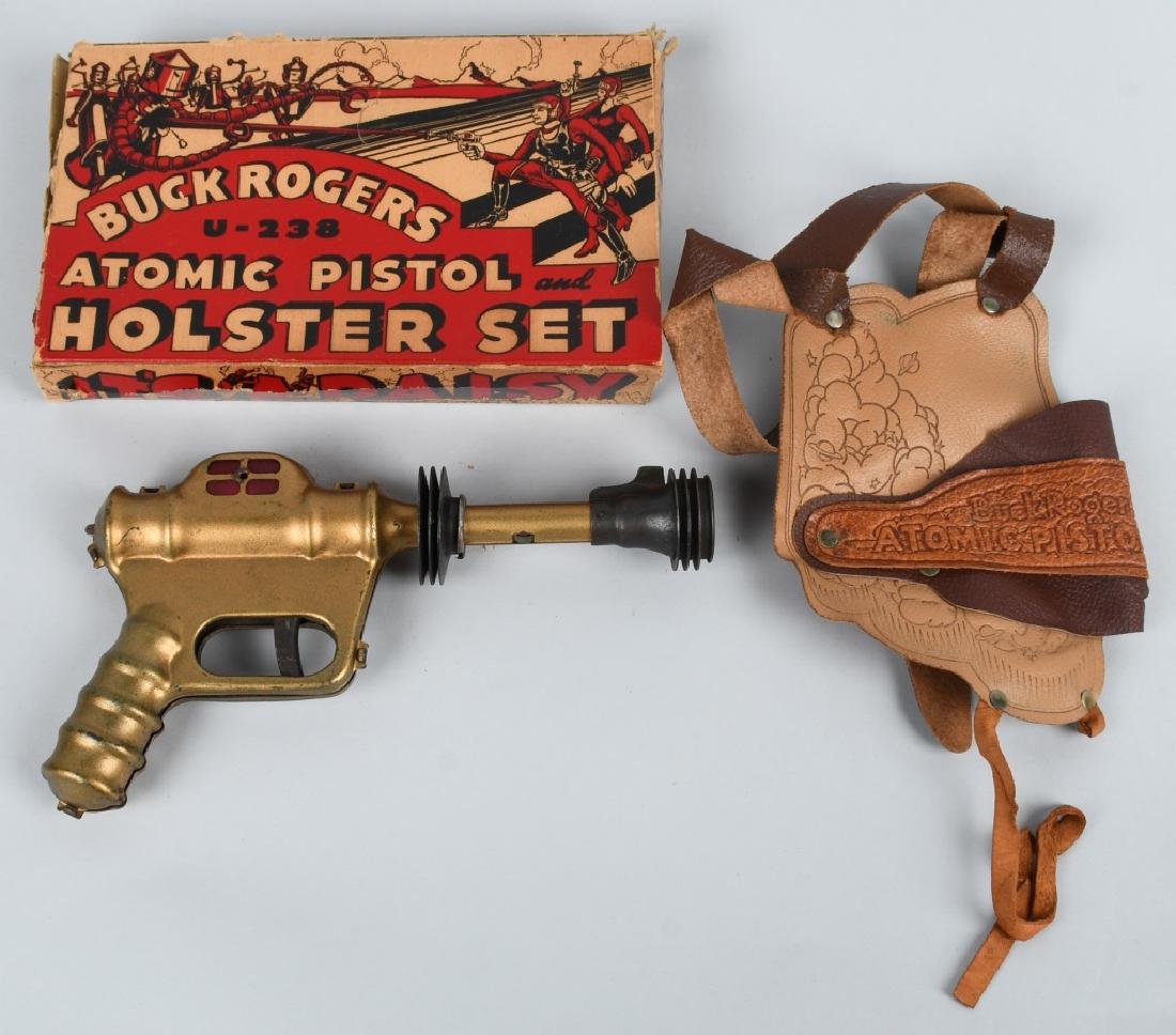BUCK ROGERS ATOMIC PISTOL & HOLSTER SET w/ BOX: Excellent Daisy Buck Rogers U-238 Atomic Pistol and Holster Set. All original and looks basically never played with condition. Leather holster looks great. Gun works. Comes with Very RARE original box