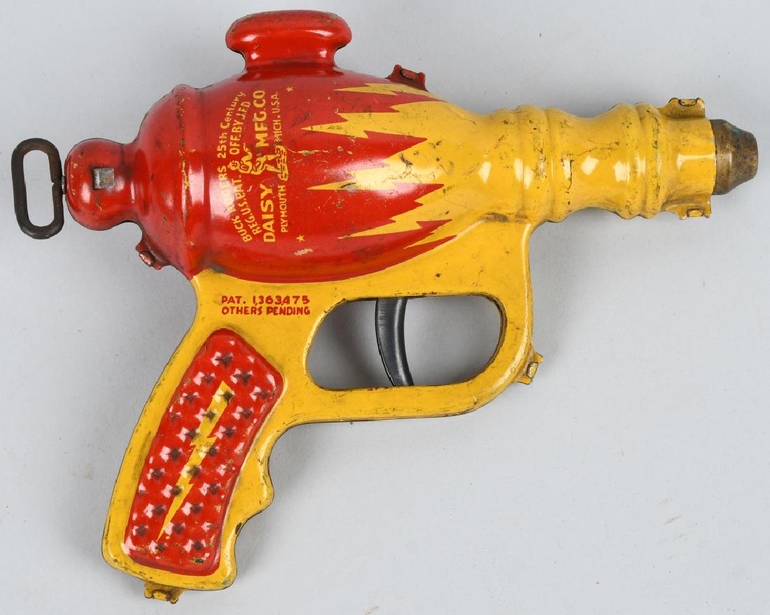 DAISY BUCK ROGER LIQUID HELIUM PISTOL: Scarce Daisy Buck Roger Liquid Helium Water Pistol. All original and complete. 8" Very Good