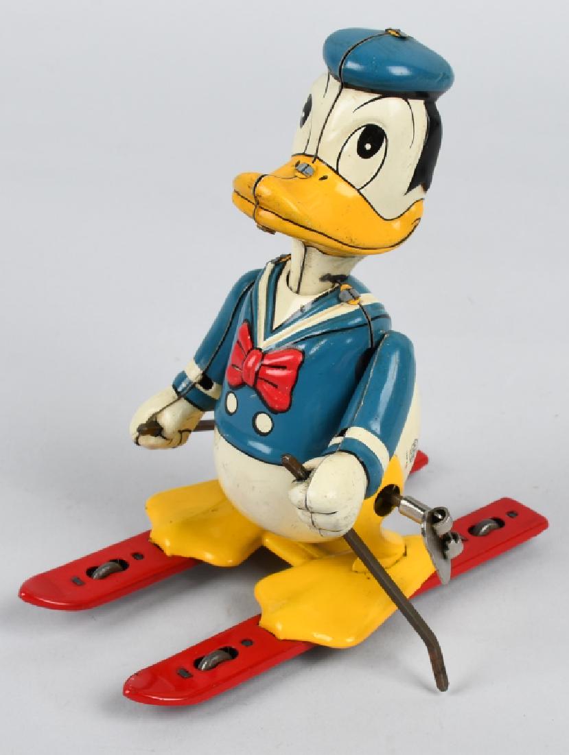 MARX Tin Windup DONALD DUCK SKIER (1 of 4)