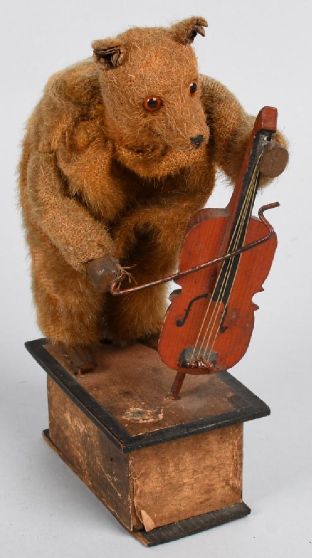 GERMAN SQUEEZE TOY BEAR PLAYING CELLO (1 of 4)