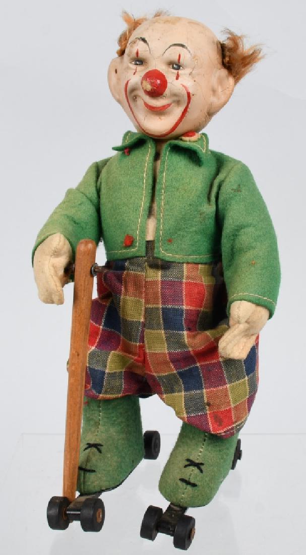 SCHUCO Windup CLOWN ROLLER SKATER (1 of 4)
