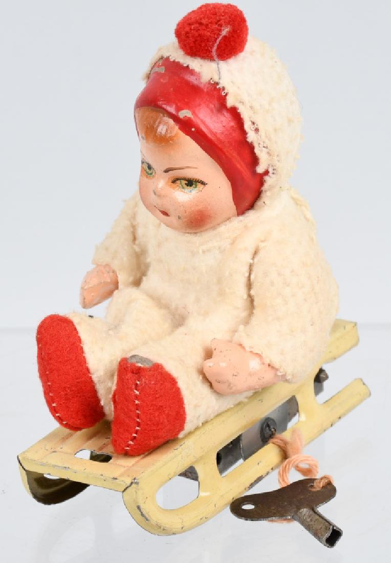 US ZONE Windup SNOW BABY ON SLED (1 of 4)