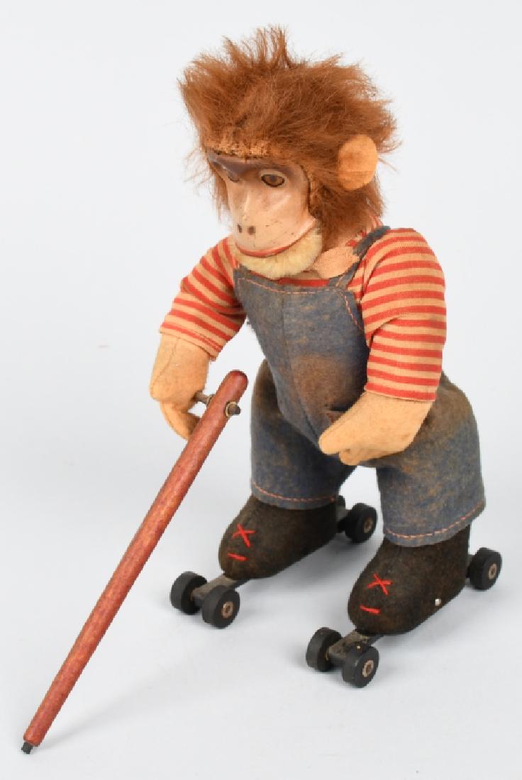 SCHUCO WINDUP ROLLER SKATING MONKEY (1 of 5)