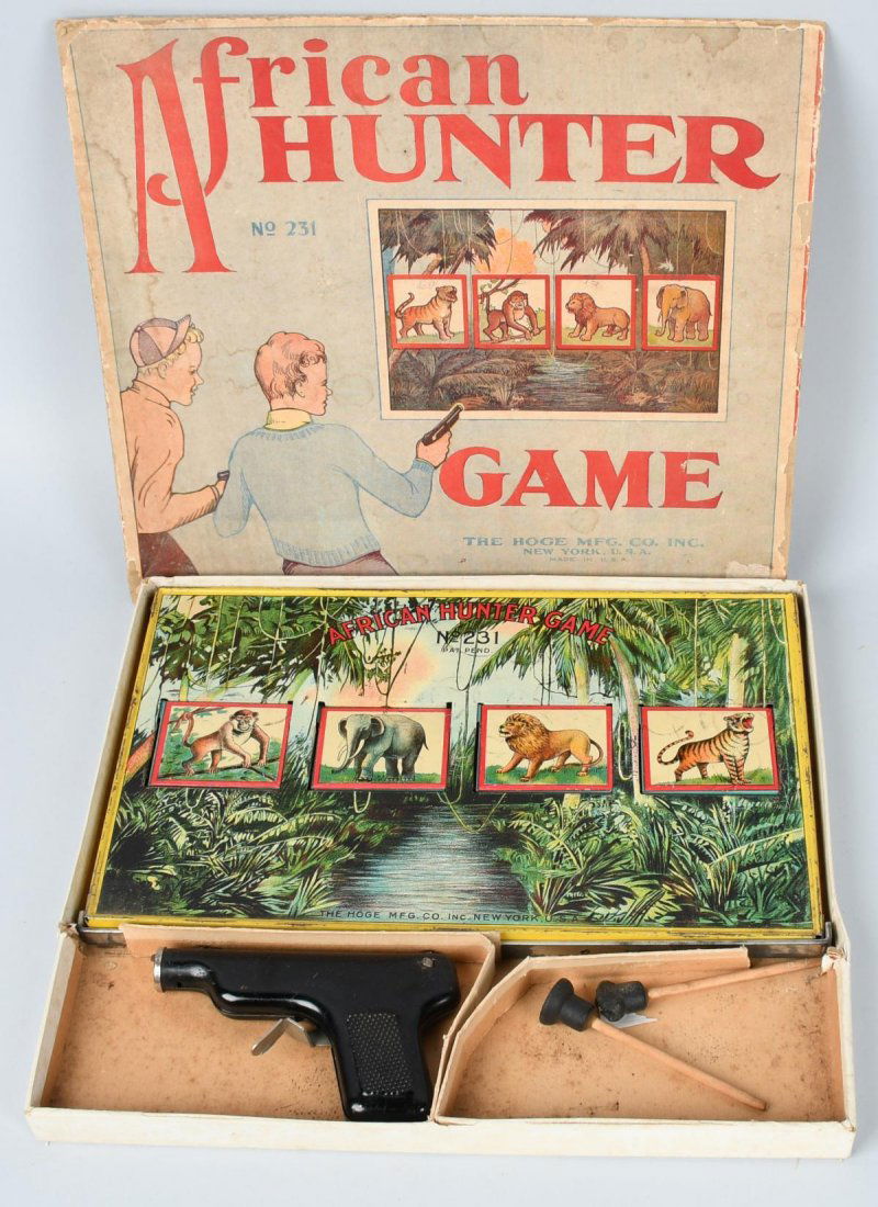HOGE tin AFRICAN HUNTER TARGET GAME w/ BOX: Scarce tin target game in the original box, made by Hoge MFG Co. in the 1920\'s. Great graphics. Box measures 13 1/2\' by 12\". Very Good-excellent