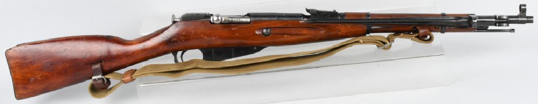 RUSSIAN MODEL 1891, MOSIN-NAGANT 7.62mm CARBINE: SN RX3070, Dated 1945 on breech. Numbers match on barrel, bolt and buttplate. 20 1/2" barrel with excellent bore. Has folding bayonet and canvas sling. Very good finish and nice markings. Stock shows 