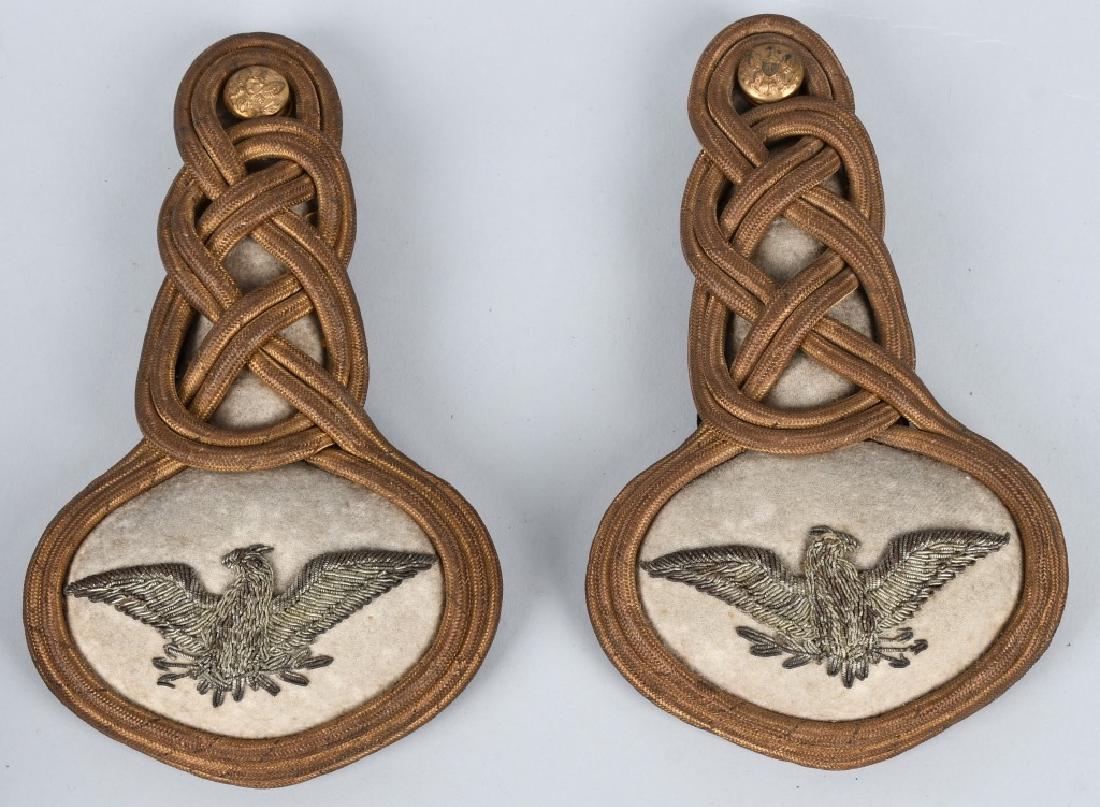 INDIAN WARS INFANTRY COLONEL EPAULETTES PETTIBONE: Set of Infantry colonel epaulettes made by the Pettibone Mfg. Co. Cincinnati, Ohio. The braid and embroidered eagles are in near mint condition as are the wool backing. Each epaulette is manufacturer
