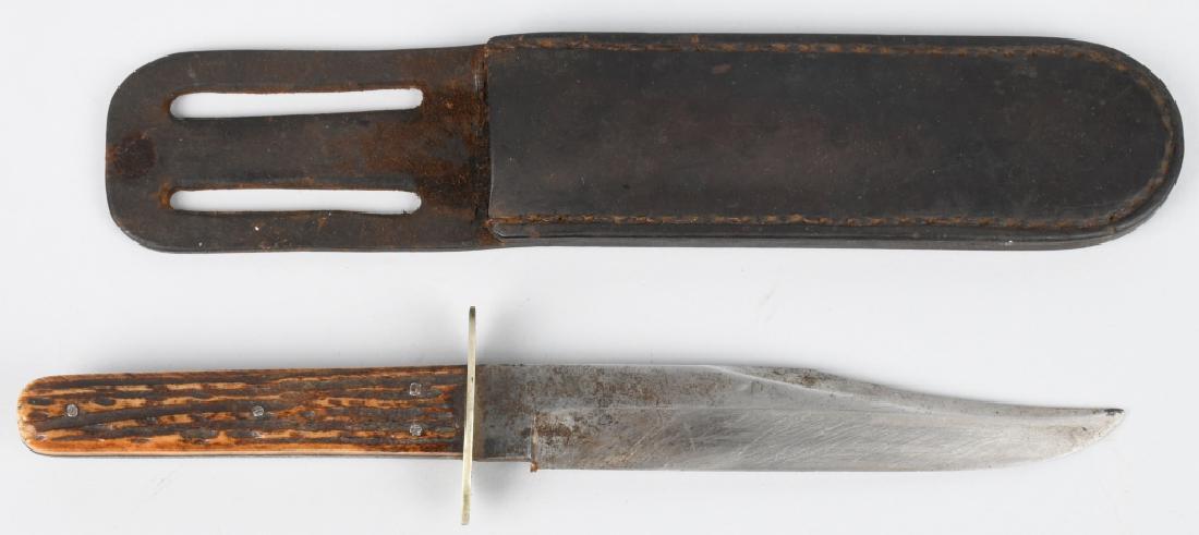 1880S DICKINSON SHEFFIELD BOWIE KNIFE WITH SHEATH: 1880s era Bowie Knife, marked "E. M. DICKINSON SHEFFIELD ENGLAND." Has 6" Blade, 4" handle, with pinned stag grips. Sheath is marked "HEART BRAND." Very good - excellent.