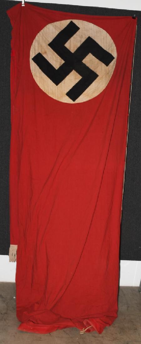 WWII NAZI GERMAN BUILDING BANNER FLAG: Unusual building banner measuring 223"x46". All original with hanging string and metal rings. Flag has original white fringe along the bottom. Excellent