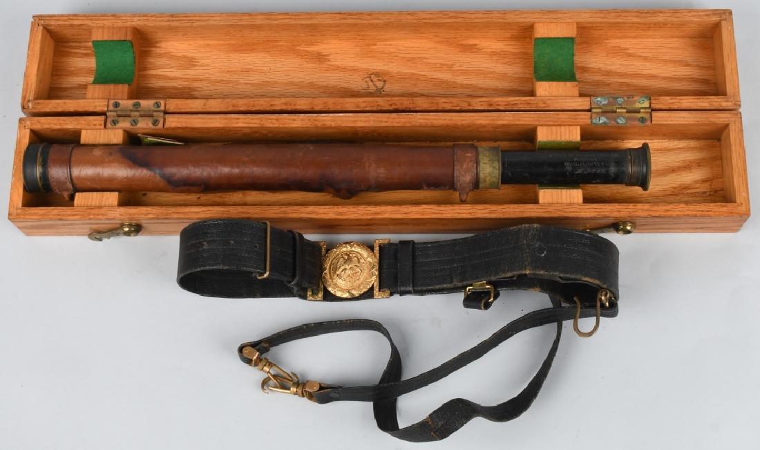 WWII US NAVAL OFFICER SWORD BELT & SPYGLASS: US Navy Officer's leather belt with two-piece buckle, and sword hanger straps. 21" 12 1/2 -Power Spyglass Marked "U.S. NAVY OFFICER OF THE DECK SPYGLASS POWER 12 1/2" "KLUFFEL & ESSER CO. NY" Serial N