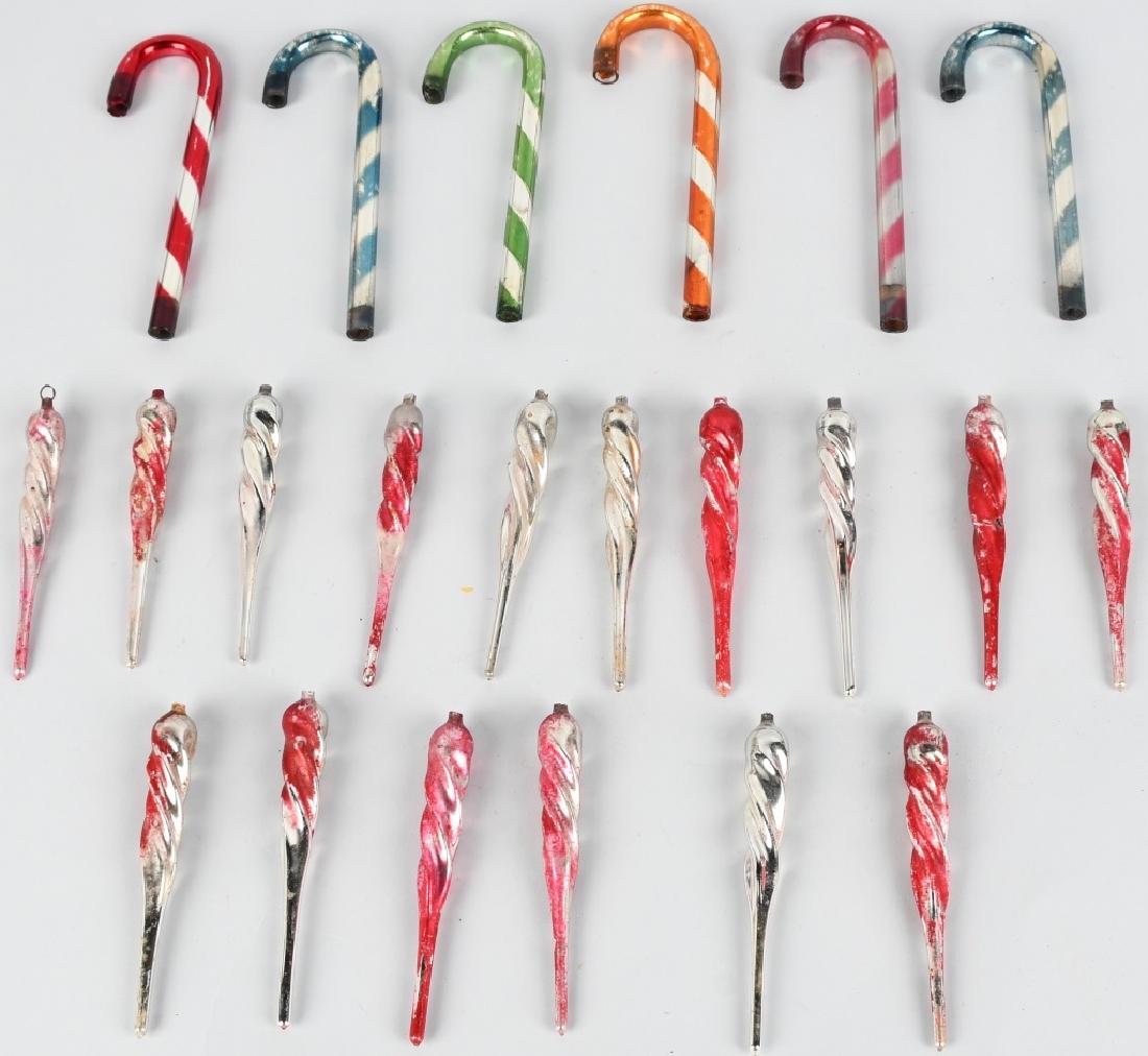 22-VINTAGE CHRISTMAS ORNAMENTS: Nice lot of vintage blown glass candy cane and spiral ornaments. Largest is 6 1/2". Very Good-Excellent