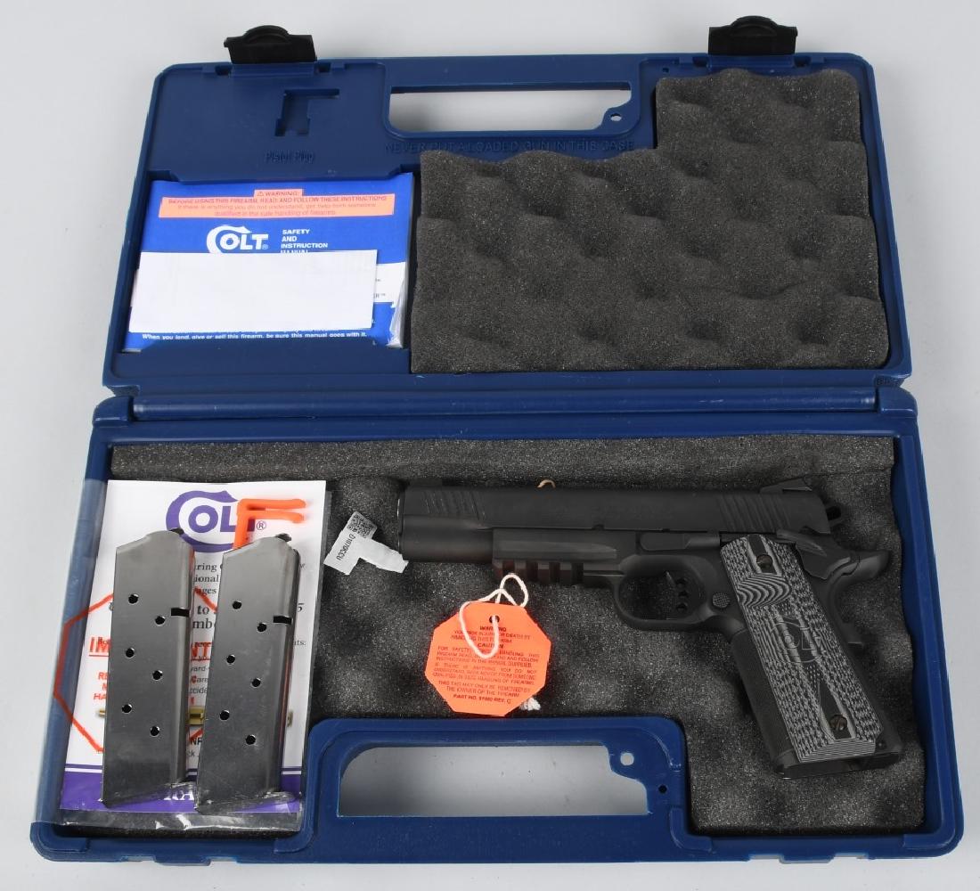 COLT GOVERNMENT .45 "COMBAT UNIT" BOXED # 911: UNIQUE # SN CCU00911. 5" barrel Semi-Automatic pistol in .45 ACP. This is the "Combat Unit Rail" Government Model, Series 80, of the 1911 pistol. Has integral rail in the front, National Match barrel,