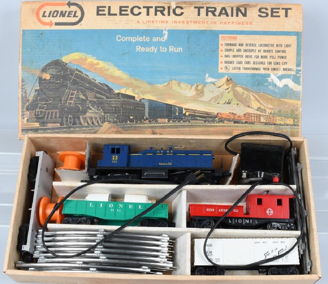 LIONEL PW 11530 5 UNIT DIESEL FREIGHT SET W/ BOX: Lionel 11530 5 unit diesel freight set with box o-gauge 634 Alco switcher has screw hole crack and looks like has been repaired engine very clean very lightly ran 6142 gondola & flatcar with 2 orange
