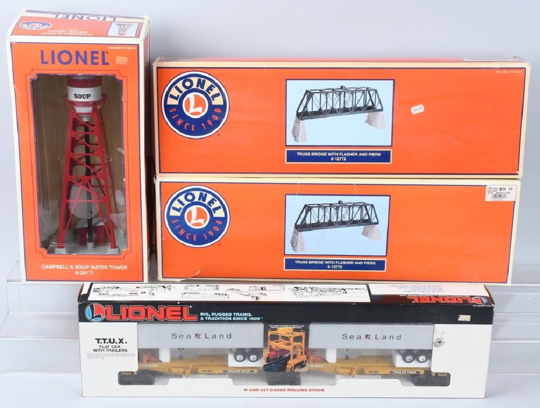 LIONEL LOT OF MODERN TRAIN ACCESSORIES & CAR: Lionel lot of modern train accessories and car 6-12772 x 2 truss bridge with flasher and piers, 6-16322 sealand t.t.u.x flatcar set & 6-24171 Campbell's soup water tower blinking light does not work e