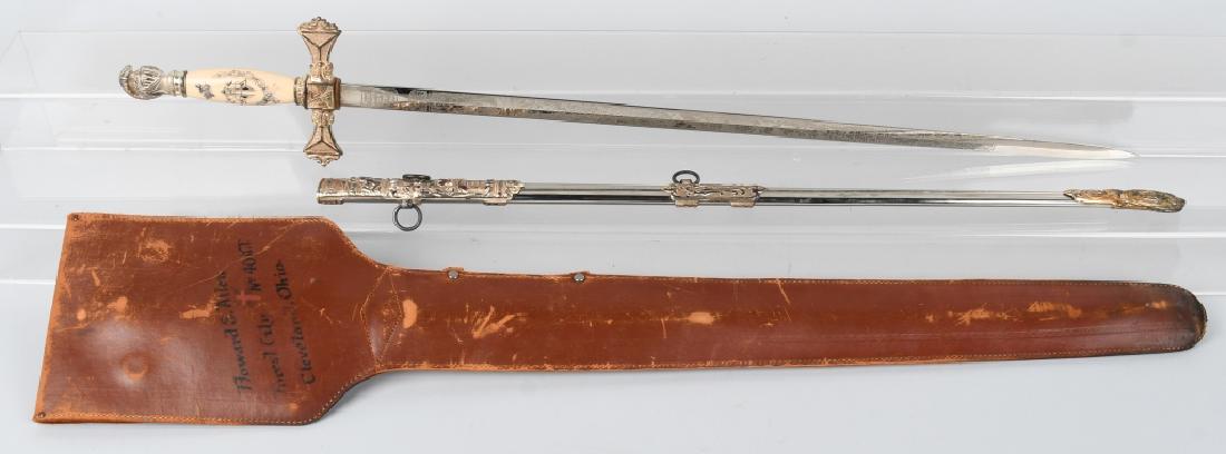 KNIGHTS of TEMPLAR FRATERNAL SWORD ID'D: Sword was made by M.C. Lilley in the late 19th century. 33" overall with a26" blade. Very ornate, and blade is profusely etched and named to:Howard S. Allen. Includes leather case that is also named.