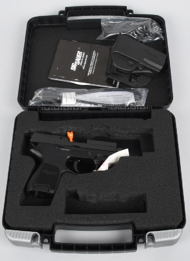 SIG SAUER P250 45 PISTOL BOXED: SN 57C058127, MFG August 7, 2018, 3 1/2" barrel, brand new unfired pistol. Includes hard case, holster, paperwork, extra magazine and gun lock. Mint*