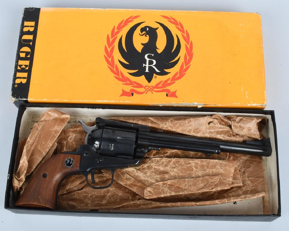 RUGER BLACKHAWK 30 CARBINE 7.5 INCH BARREL BOXED: SN 50-03902. 7.5" Barrel, 6-shot single-action revolver in .30 Carbine. Ruger Blackhawk, in the box. Features smooth walnut Ruger medallion grips, fixed ramp front sight, protected rear sight. Bore ne