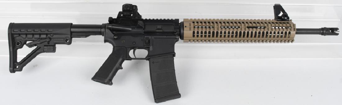 ANDERSON MFG. AM 15 M 4 STOCK 5.56: SN. 16408675. 18.5" Barrel, semi-automatic rifle in 5.56. This is an M4 carbine AR platform built on an Anderson Manufacturing AM-15 multi-caliber lower receiver, with UTG / Leaper's front sight, IS f