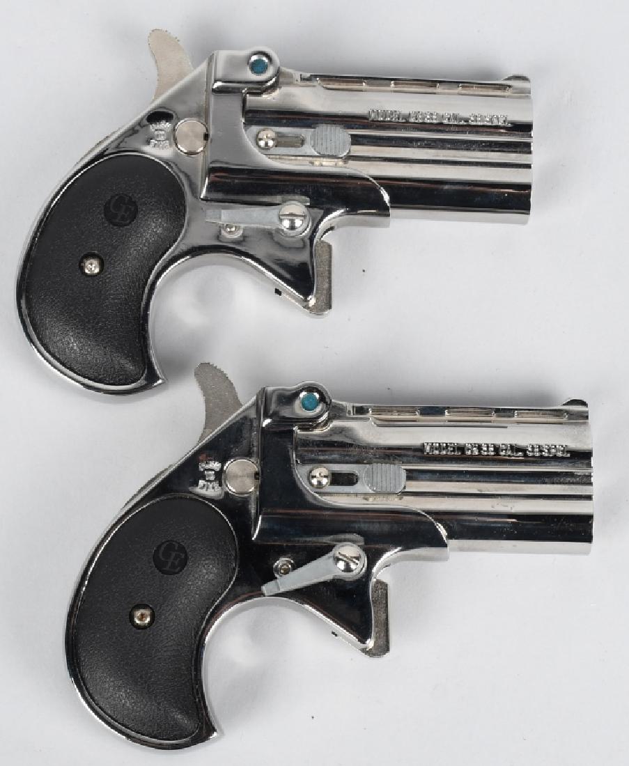 2 CONSECUTIVE SN CHROME COBRA 38 CAL DERRINGERS: SNs CT10357 & CT10358 -- consecutive serial numbers. 2.75" Over / Under double-barreled derringer pistols in .38 Caliber. Cobra Enterprises of Utah, Inc. model CB 38. Both have chrome finish, with fix